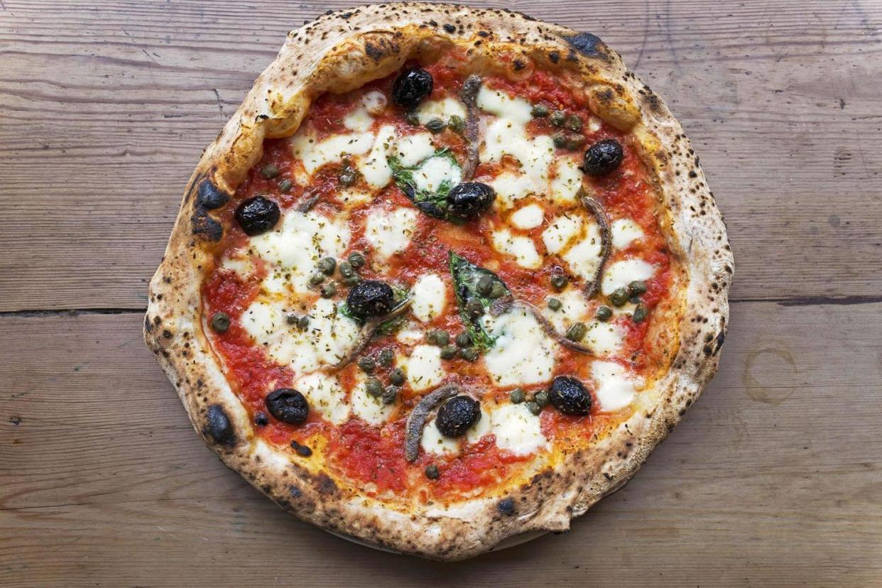 Top crust: smoked Napoli pizza, with anchovies, olives and capers