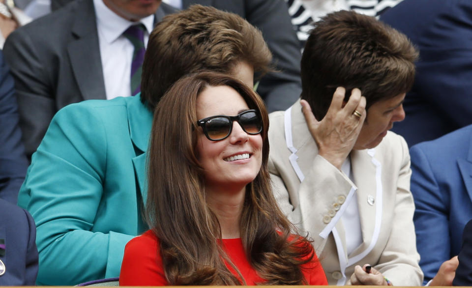 Britain's Catherine Duchess of Cambridge watches the match between Andy Murray of Britain and Vasek Pospisil of Canada at the Wimbledon Tennis Championships in London, July 8, 2015. REUTERS/Suzanne Plunkett