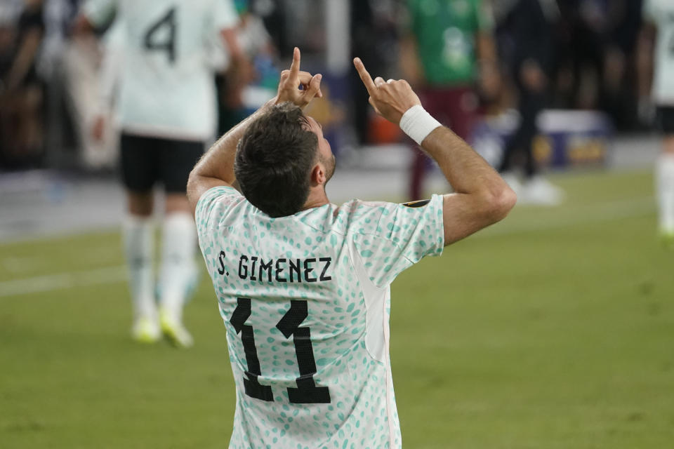 Mexico' Santiago Gimenez (11) points to the sky after the team's third goal against Haiti, during the second half of a CONCACAF Gold Cup soccer match Thursday, June 29, 2023, in Glendale, Ariz. Mexico won 3-1. (AP Photo/Darryl Webb)