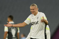 Manchester City's Erling Haaland gestures during a training session at the Ataturk Olympic Stadium in Istanbul, Turkey, Friday, June 9, 2023. Manchester City and Inter Milan are making their final preparations ahead of their clash in the Champions League final on Saturday night. (AP Photo/Antonio Calanni)