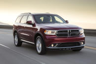 <b>2. <a href="https://autos.yahoo.com/dodge/durango/" data-ylk="slk:2014 Dodge Durango;elm:context_link;itc:0;sec:content-canvas" class="link ">2014 Dodge Durango</a></b><br>It baffles us why the Ford Explorer outsells the Durango by a ratio of more than 3-to-1. The Durango's rear-drive roots make for better handling, even for a large SUV, while the brash styling and black-tie interior should appeal to any shoppers, family or otherwise. A decent third row, optional second-row captain's chairs and a terrific multimedia system also help.