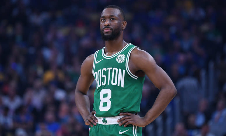 Kemba Walker stands on the court during a game for the Boston Celtics.