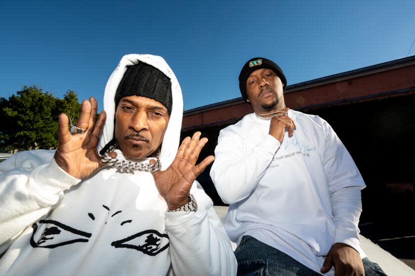 LOS ANGELES - JANUARY 12, 2024: Producer Hit-Boy (right) and his father, rapper Big Hit at Chalice Studios in Hollywood, California on January 12, 2024. (Walter W. Brady / For The Times)