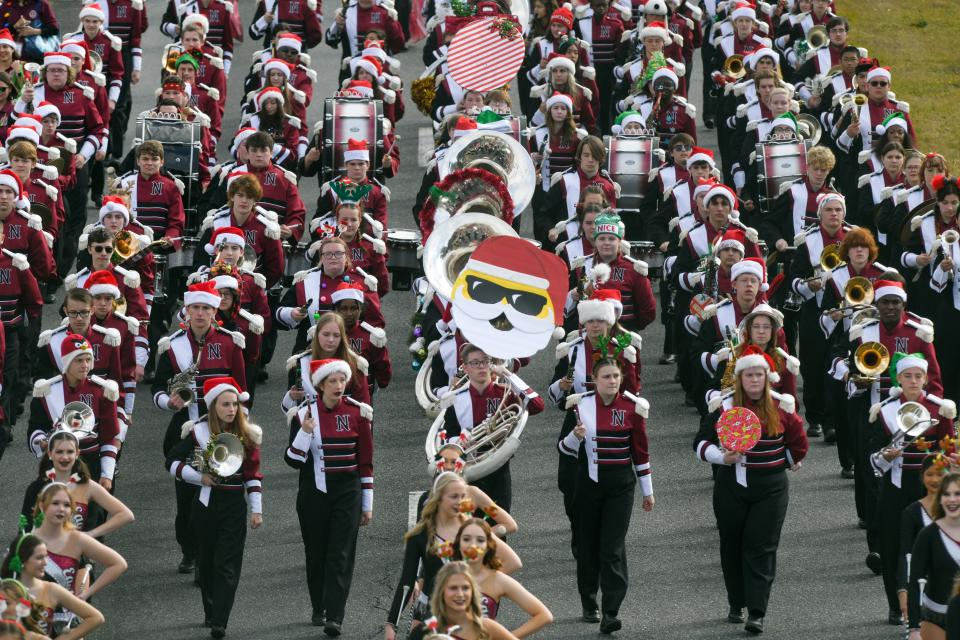 The Niceville High School Eagle Pride band performs in last year's Niceville Valparaiso Community Christmas Parade along John Sims Parkway in Niceville. This year's Christmas Parade is scheduled for Saturday, Dec. 10 at 10 a.m.