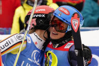 Second placed United States' Mikaela Shiffrin, right, embraces the winner Germany's Lena Duerr after completing an alpine ski, women's World Cup slalom, in Spindleruv Mlyn, Czech Republic, Sunday, Jan. 29, 2023. (AP Photo/Piermarco Tacca)