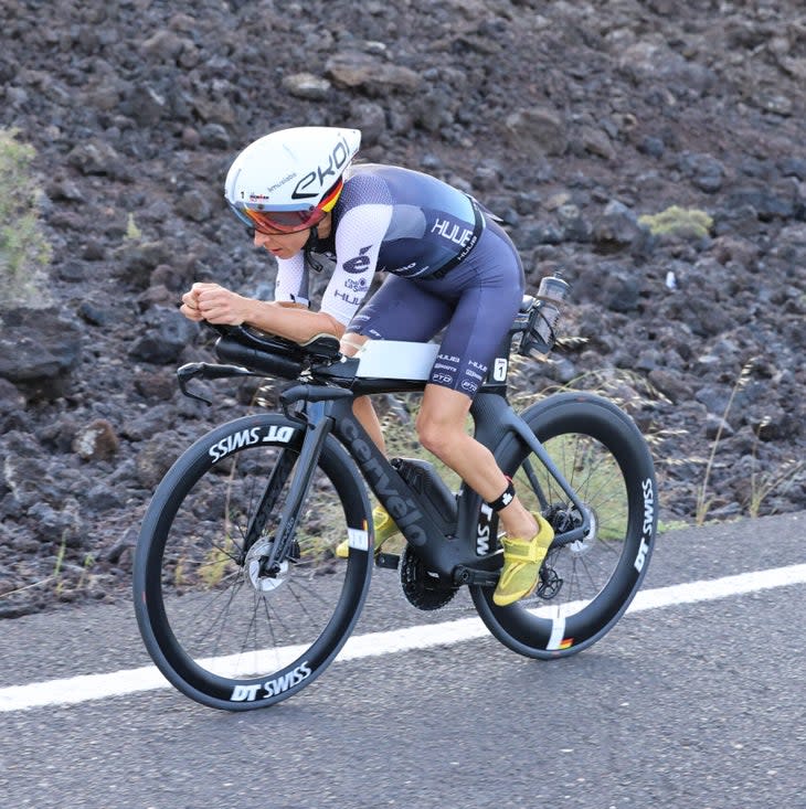 <span class="article__caption">Anne Haug riding through the lava fields in high winds on her way to a 4:16:47 victory at Ironman 70.3 Lanzarote.</span> (Photo: Ryan Sosna-Bowd/ Getty Images)