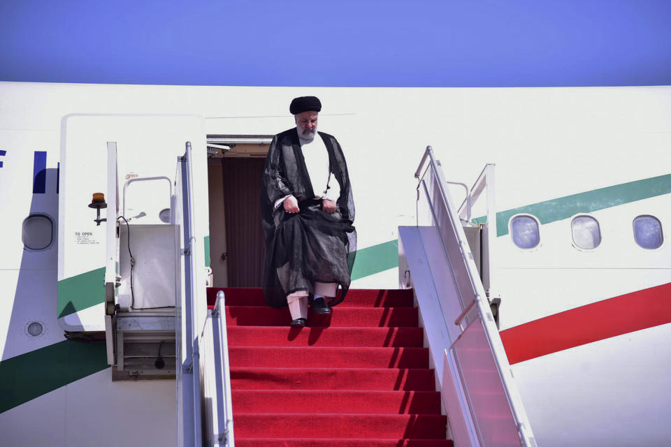 In this photo released by Pakistan's Ministry of Foreign Affairs, Iranian President Ebrahim Raisi gets down from plane upon his arrival in Islamabad, Pakistan, Monday, April 22, 2024. Raisi arrived in Islamabad on a three-day visit on Monday, during which he will discuss a range of issues with authorities in Pakistan's capital, officials said. (Ministry of Foreign Affairs via AP)