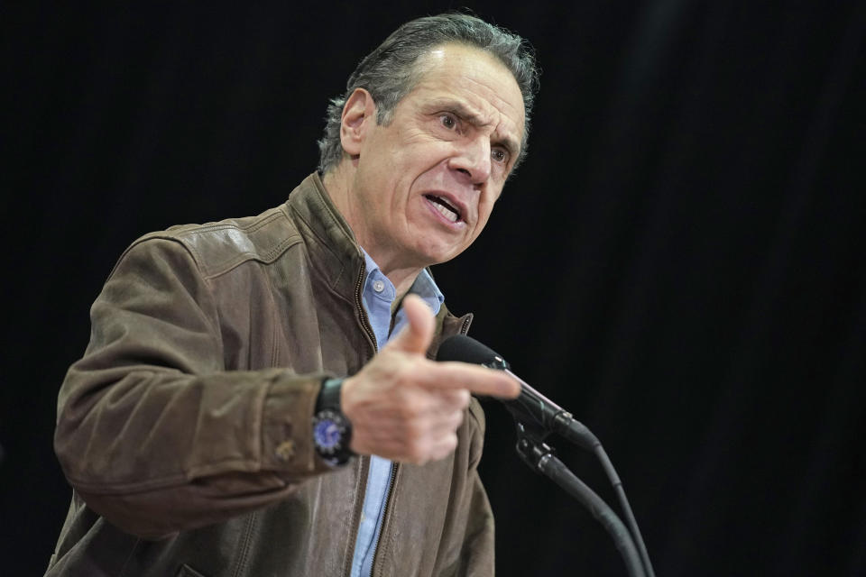 FILE - In this Wednesday, Feb. 24, 2021, file photo, New York Gov. Andrew Cuomo speaks during a press conference before the opening of a mass COVID-19 vaccination site in the Queens borough of New York. A former aide’s allegations that Gov. Cuomo subjected her to an unwanted kiss during years of sexual harassment have spurred calls for an investigation — and questions about who might meaningfully conduct one. (AP Photo/Seth Wenig, Pool, File)