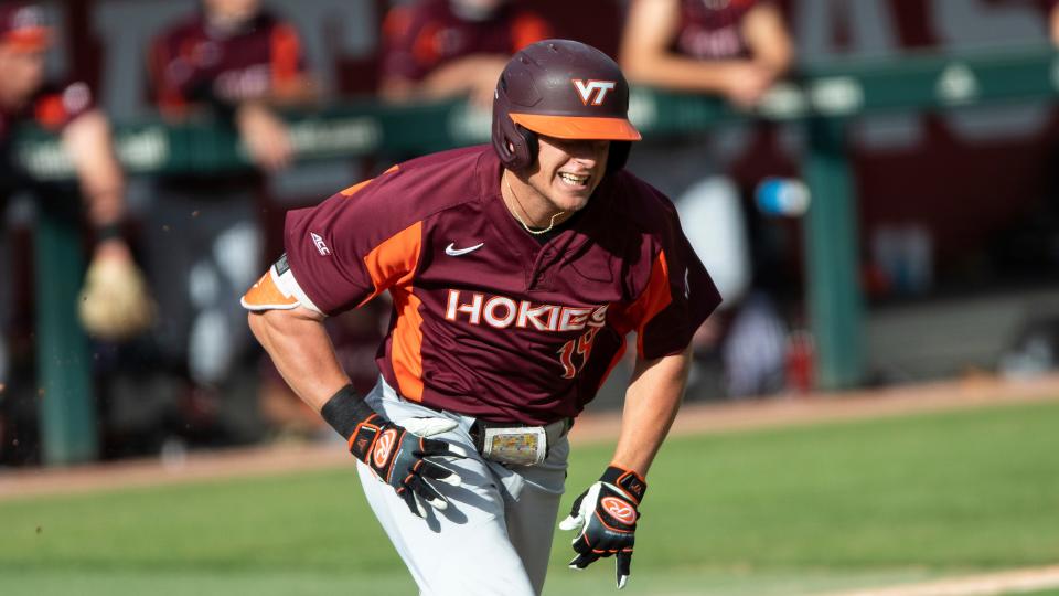 Virginia Tech's Gavin Cross runs to first base during an NCAA baseball game Sunday, April 25, 2021, in Raleigh, N.C.