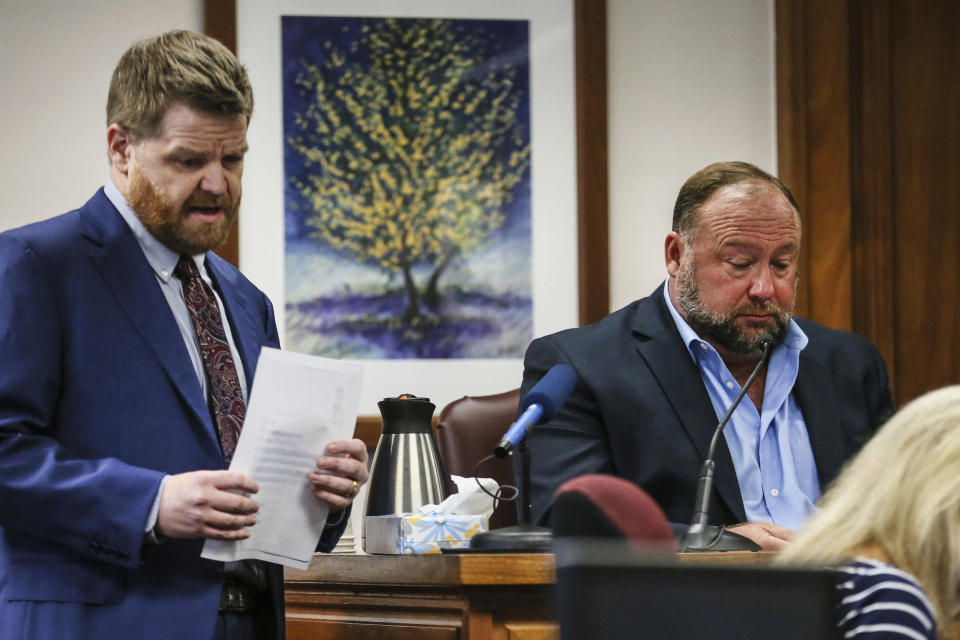 Image: Mark Bankston, lawyer for Neil Heslin and Scarlett Lewis, asks Alex Jones questions about text messages during trial at the Travis County Courthouse in Austin, on Aug. 3, 2022. (Briana Sanchez / Austin American-Statesman Pool via AP)