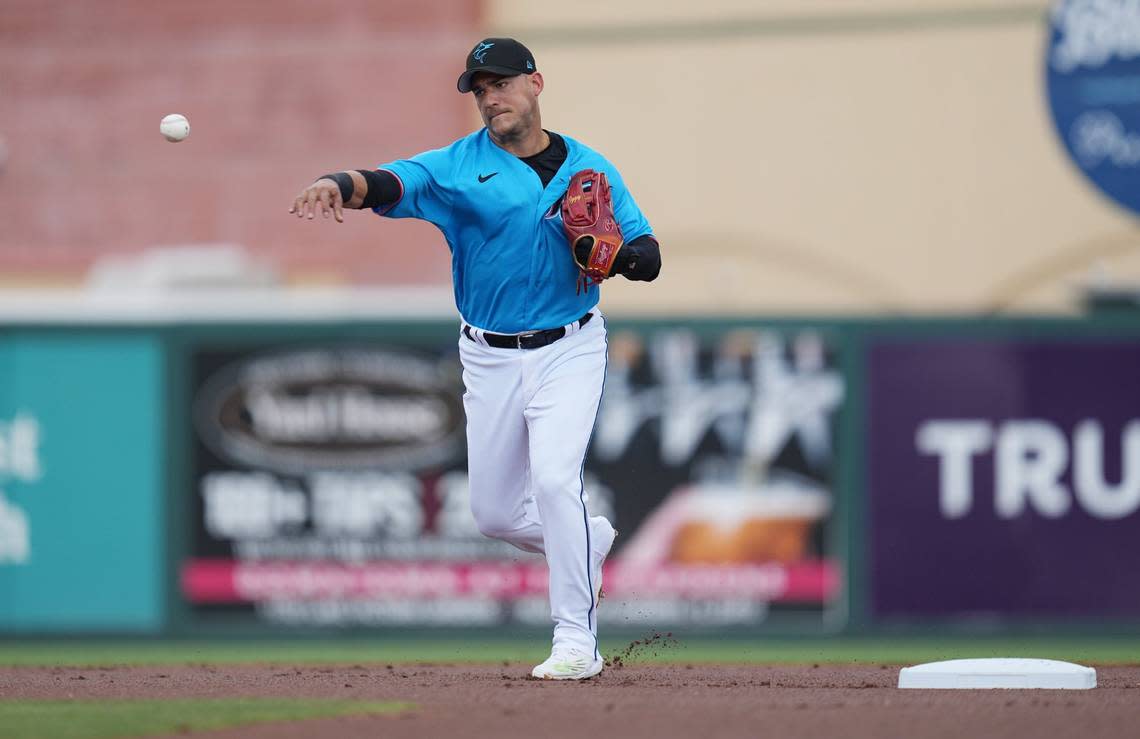 Miami Marlins shortstop Jose Iglesias (13) throws a runner out in the first inning against the New York Mets at Roger Dean Stadium in Jupiter, Florida, on Monday, March 13, 2023.