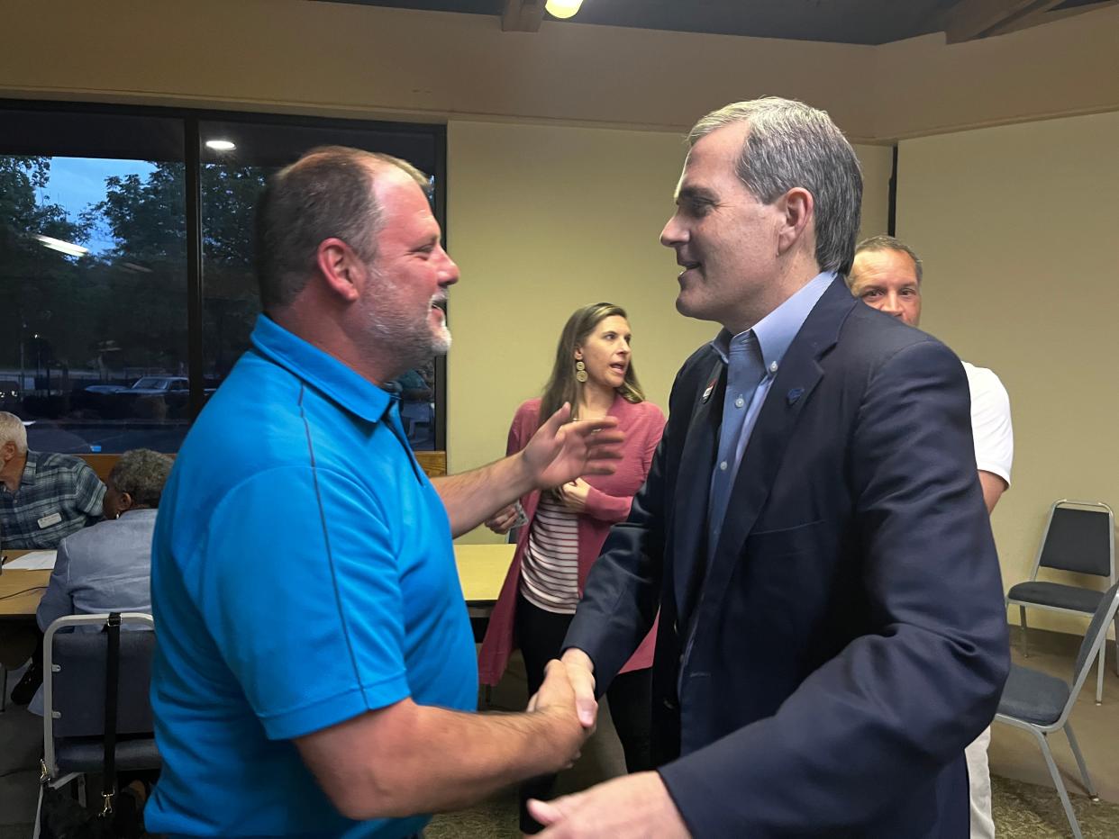 North Augusta Mayor Briton Williams, right, congratulates David Buck, left, on winning a seat on the North Augusta City Council at North Augusta Community Center on Tuesday, April 25, 2023.