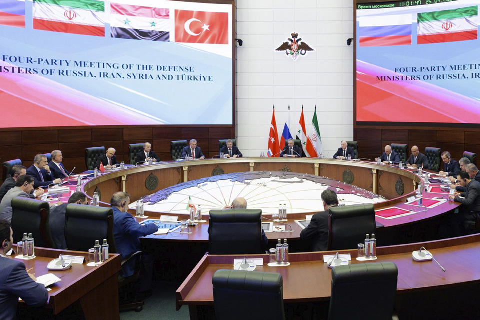 In this handout photo released by Russian Defense Ministry Press Service on Tuesday, April 25, 2023, Defense ministers from Russia, Iran, Syria and Turkey attend talks in Moscow, Russia. The talks were part of the Kremlin's efforts to help broker a rapprochement between the Turkish and Syrian governments. (Russian Defense Ministry Press Service via AP)