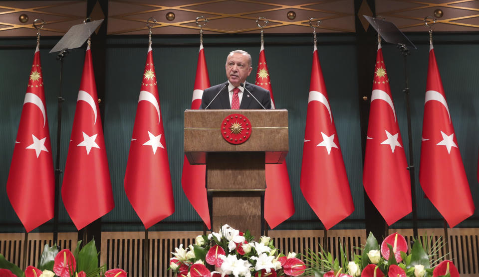 Turkey's President Recep Tayyip Erdogan speaks after a cabinet meeting, in Ankara Turkey, Monday, Aug. 10, 2020. The government of Greece slammed Turkey's announcement that it will be conducting energy exploration in an area of the eastern Mediterranean that Athens says overlaps its continental shelf, as tension over the rights to natural resources increased sharply in the region Monday.(Turkish Presidency via AP, Pool)