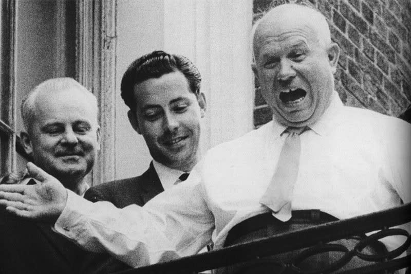 Soviet Premier Nikita Khrushchev shouts "This is my America" at a New York cabbie from his window at the Russian U.N. delegation's headquarters during the 1960 United Nations' General Assembly. On October 12, 1960, Khrushchev removed one of his shoes and pounded it on his desk during a speech before the United Nations. File Photo by Gary Haynes/UPI