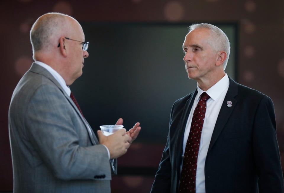 MSU President Clif Smart, who will retire this summer, visits with provost John Jasinski during an Oct. 2 event on campus.