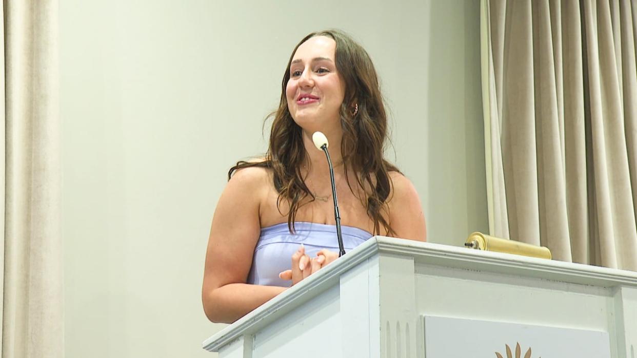 Jessica Watts, speaking at a nursing ceremony Monday night, said she hopes to work on P.E.I. in neo-natal care. (Laura Meader/CBC - image credit)
