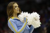 UCLA cheerleaders perform against the Florida during the first half in a regional semifinal game at the NCAA college basketball tournament, Thursday, March 27, 2014, in Memphis, Tenn. (AP Photo/Mark Humphrey)