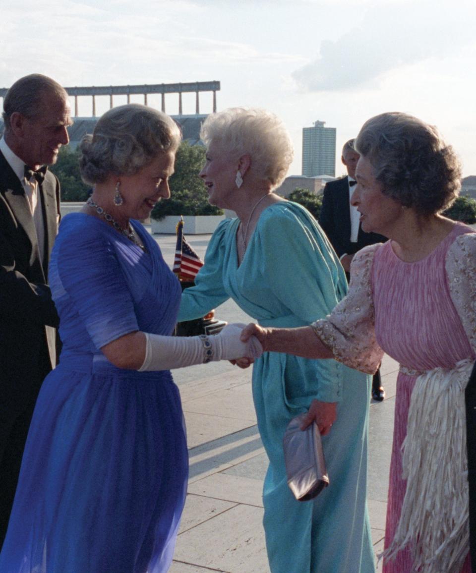 Prince Phillip, Queen Elizabeth II, Gov. Ann Richards and Lady Bird Johnson meet May 20, 1991, on the LBJ Presidential Library Plaza.