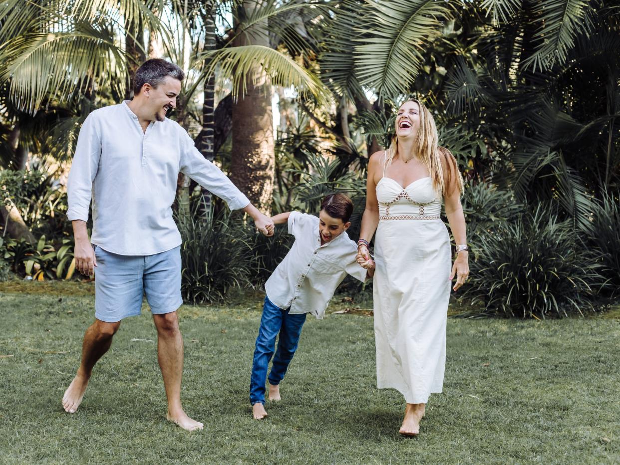 Family posing for photo in Spain