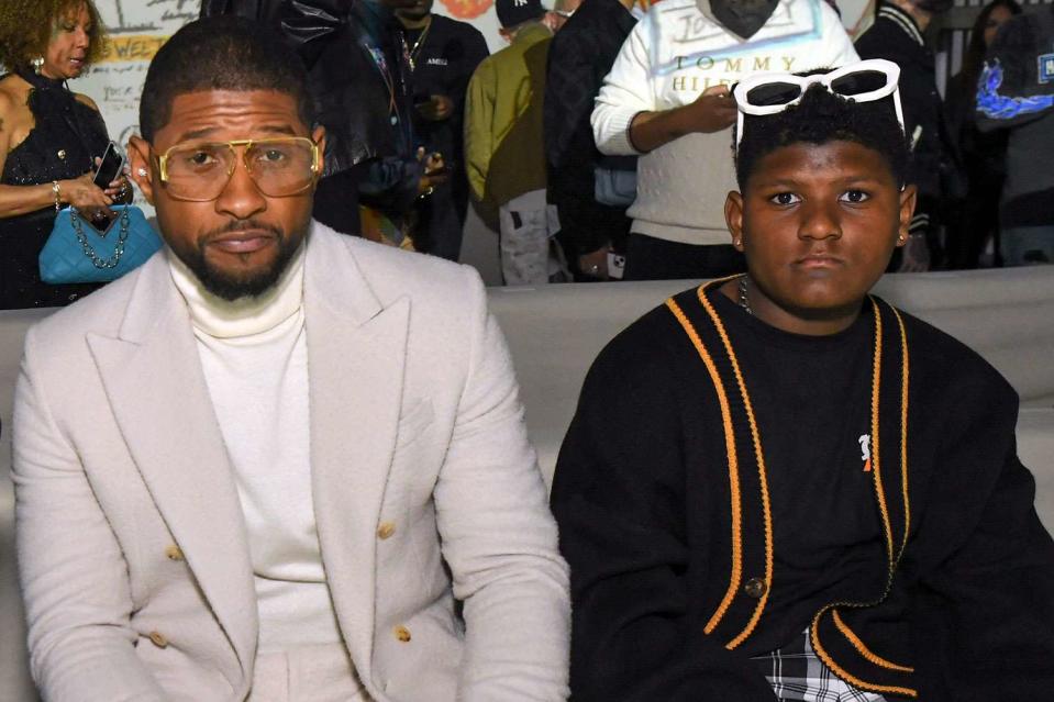 <p>Rodin Eckenroth/Getty</p> From Left: Usher with his son, Naviyd, in 2022