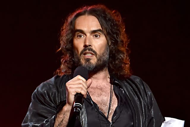 Lester Cohen/Getty for The Recording Academy Russell Brand