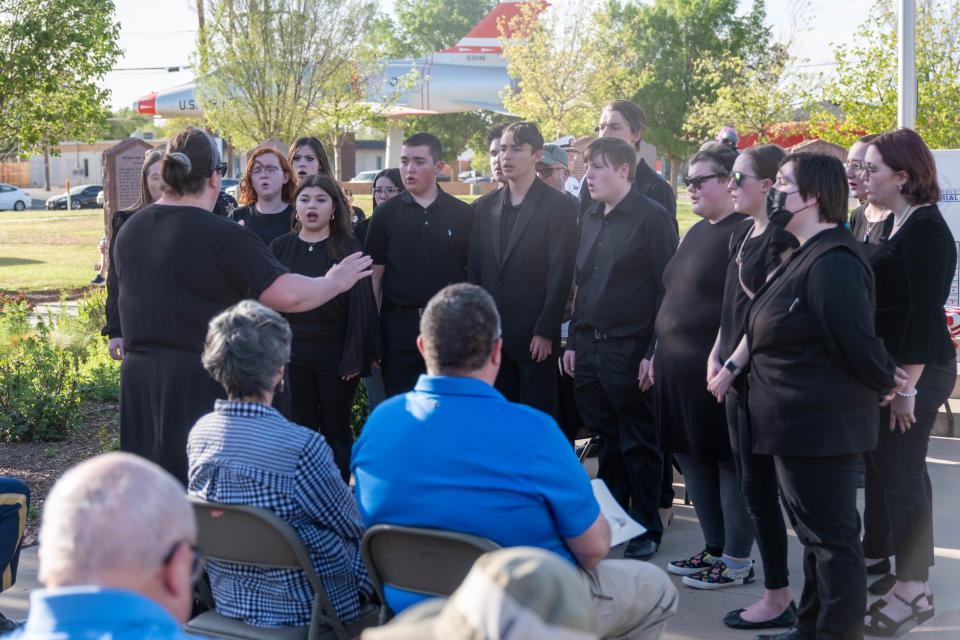 The Randall High School Show Choir sings "The Lord Bless You and Keep You" Wednesday evening during the Missing in America's Project ceremony honoring three unclaimed veterans at the Texas Panhandle War Memorial Center in Amarillo.