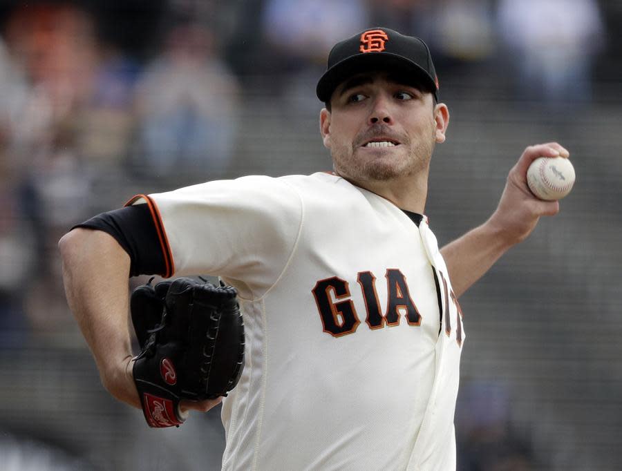 The San Francisco Giants have traded starting pitcher Matt Moore to the Texas Rangers, thus saving $9 million in salary space. (AP)