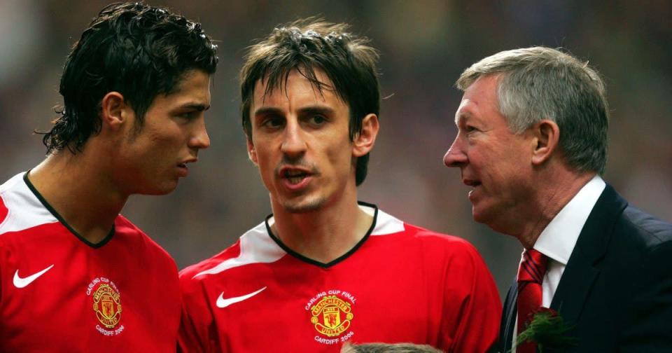 Gary Neville and Cristiano Ronaldo speaking with Sir Alex Ferguson Credit: PA Images