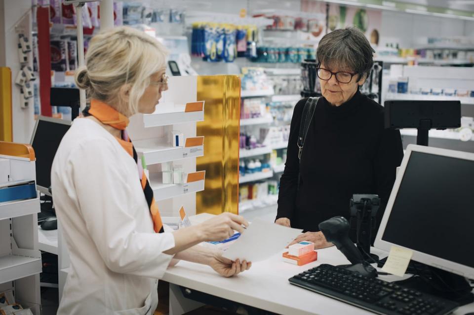 The first 10 drugs selected for negotiated pricing can be picked up at a pharmacy. <a href="https://www.gettyimages.com/detail/photo/female-owner-holding-prescription-paper-with-senior-royalty-free-image/944238626?adppopup=true" rel="nofollow noopener" target="_blank" data-ylk="slk:Maskot/Getty Images;elm:context_link;itc:0;sec:content-canvas" class="link ">Maskot/Getty Images</a>