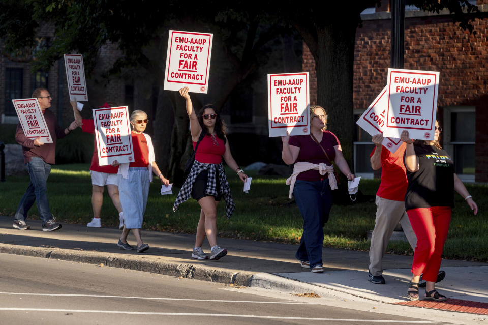 Eastern Michigan University faculty strike outside Welch Hall along Cross Street in Ypsilanti on Wednesday, Sept. 7, 2022. Several dozen faculty at Eastern Michigan University began a strike Wednesday after their union and the school's administration failed to agree on a new labor contract. (Jacob Hamilton=miarb-