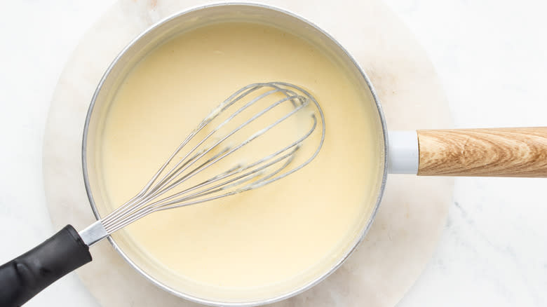 Bechamel sauce in saucepan