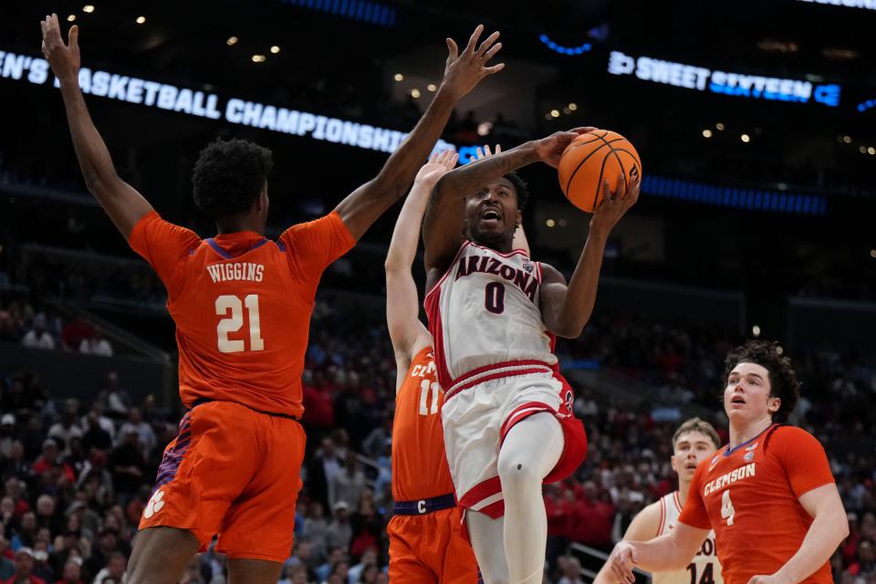 Arizona guard Jaden Bradley (0) shoots against Clemson during the semifinals of the West Regional of the 2024 NCAA men's tournament at Crypto.com Arena.