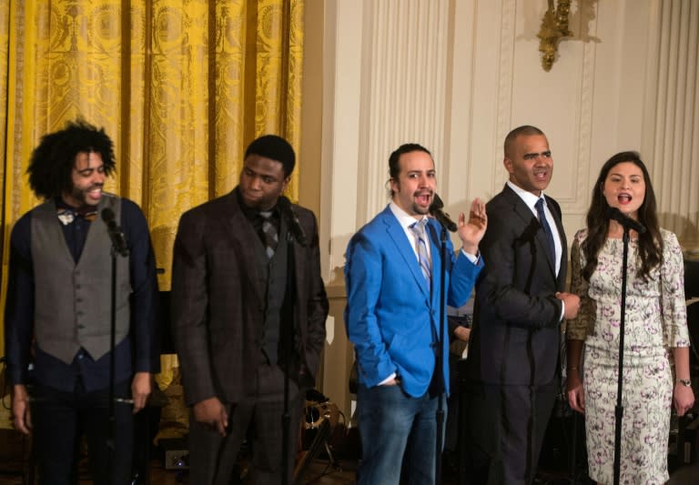 Members of the Broadway cast of the musical Hamilton, including Lin-Manuel Miranda (C), creator and star of the show, perform selections at the White House in Washington, DC on March 14, 2016