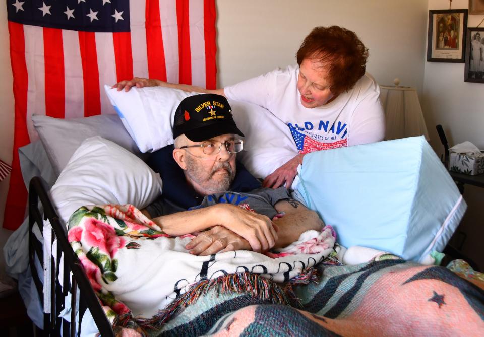 Vietnam vet, Silver Star recipient Marine Master Sgt. Michael Moro, retired, with his wife Linda, was honored at his Palm Bay home on Wednesday for his service. 