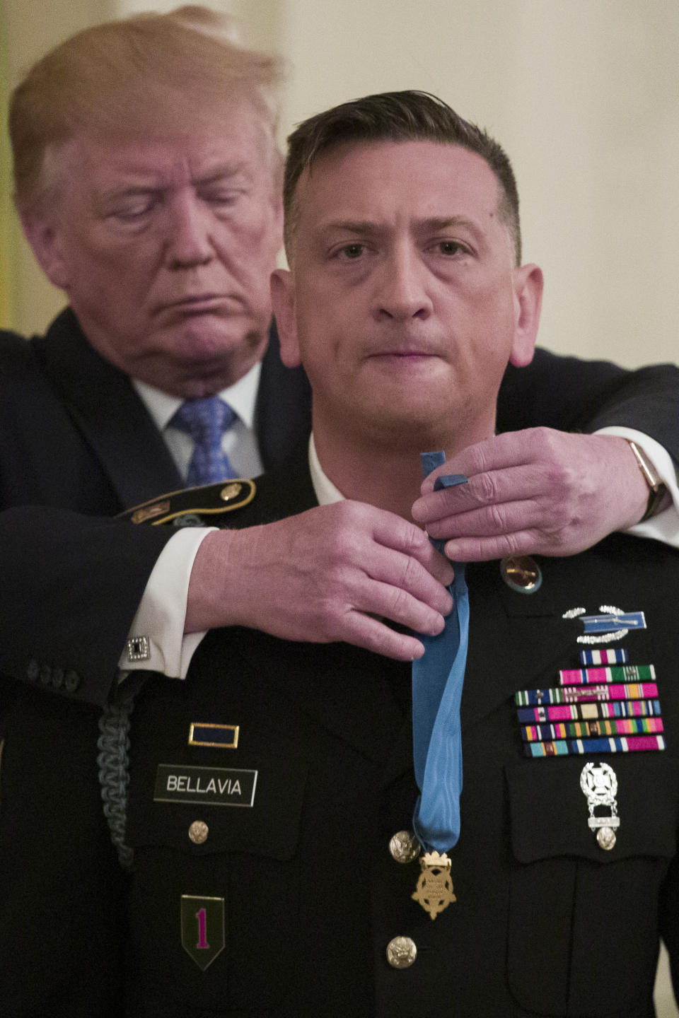 President Donald Trump awards the Medal of Honor to Army Staff Sgt. David Bellavia in the East Room of the White House in Washington, Tuesday, June 25, 2019, for conspicuous gallantry while serving in support of Operation Phantom Fury in Fallujah, Iraq. (AP Photo/Alex Brandon)