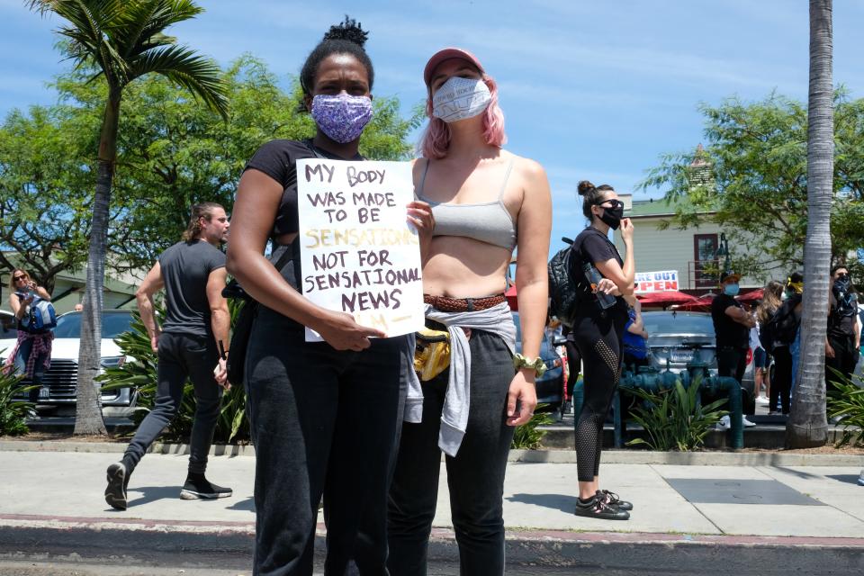 Morgan Rameny, left, and Melanie Hoglund attend the Los Angeles protests on March 30. Photo by Stacey Leasca.