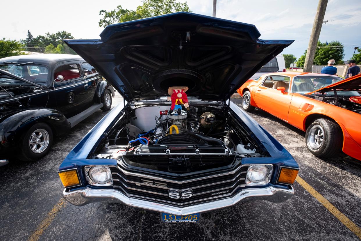 Cars fill parking lots along 24th Avenue on Blue Water Cruise Night Friday, June 28, 2019 in Fort Gratiot.