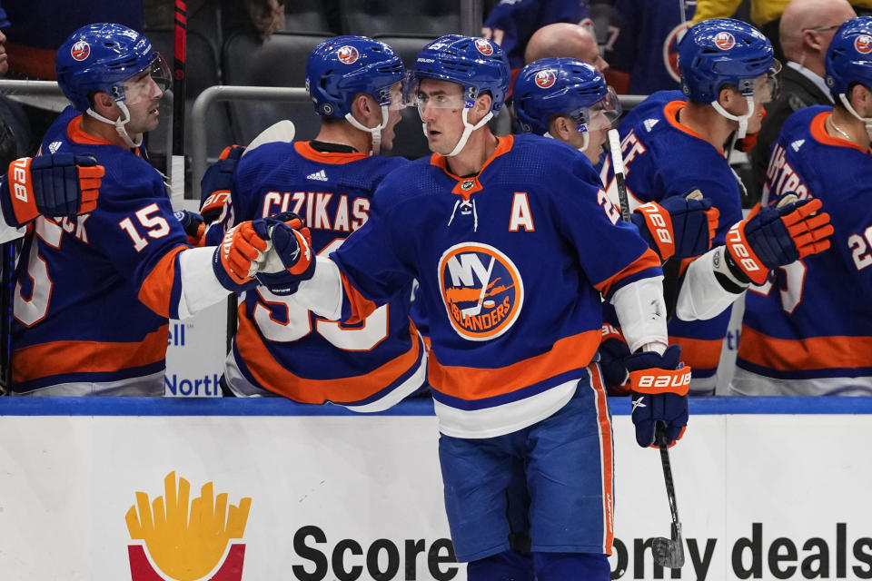 New York Islanders' Brock Nelson (29) is congratulated for his goal against the Philadelphia Flyers during the third period of an NHL hockey game Wednesday, Nov. 22, 2023, in Elmont, N.Y. (AP Photo/Frank Franklin II)