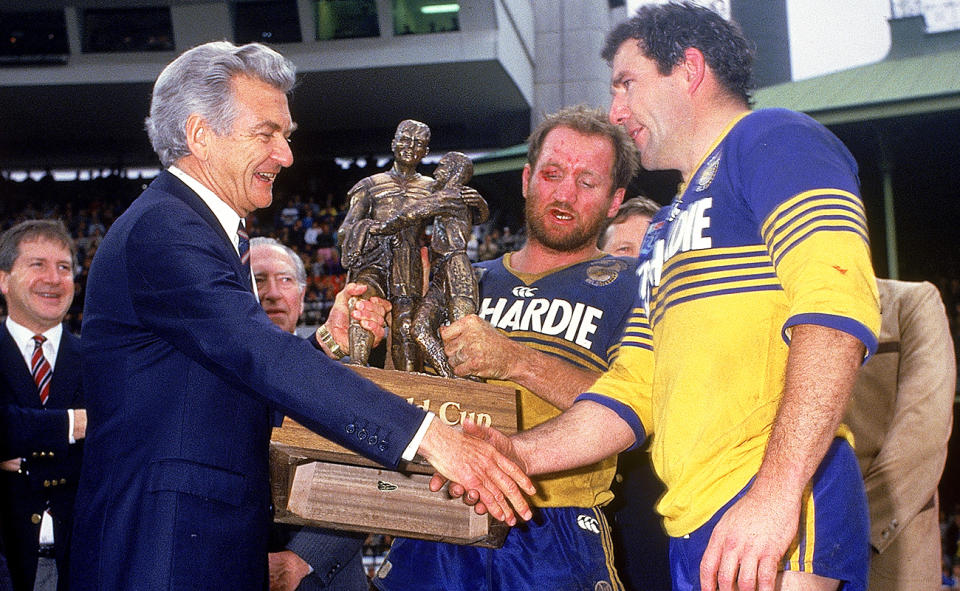 Bob Hawke congratulates Ray Price and Mick Cronin after Parramatta's victory in the 1986 grand final. (Photo by Patrick Riviere/Getty Images)