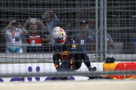 Red Bull driver Max Verstappen of the Netherlands gets out of his car after crashing out during the Formula One Grand Prix at the Baku Formula One city circuit in Baku, Azerbaijan, Sunday, June 6, 2021. (Maxim Shemetov, Pool via AP)