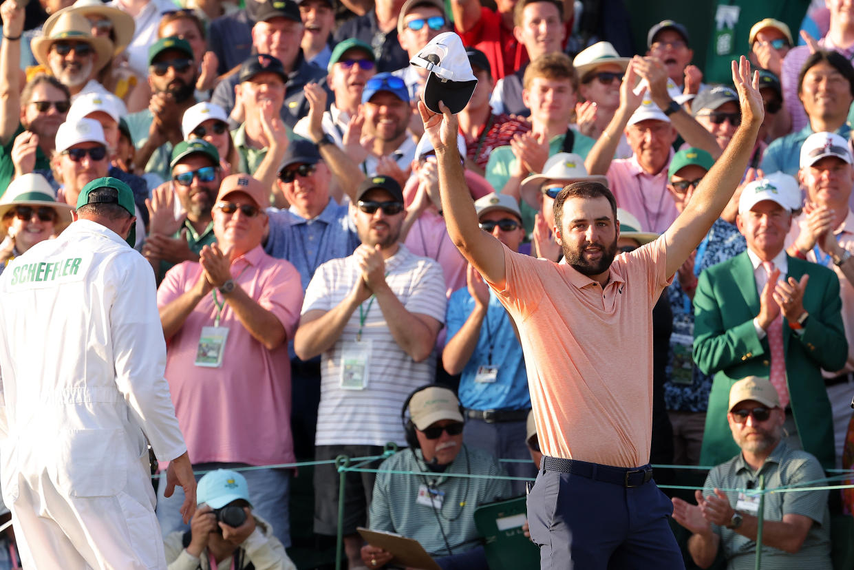 AUGUSTA, GEORGIA - APRIL 14: Scottie Scheffler of the United States celebrates on the 18th green after winning the 2024 Masters Tournament at Augusta National Golf Club on April 14, 2024 in Augusta, Georgia. (Photo by Jamie Squire/Getty Images)