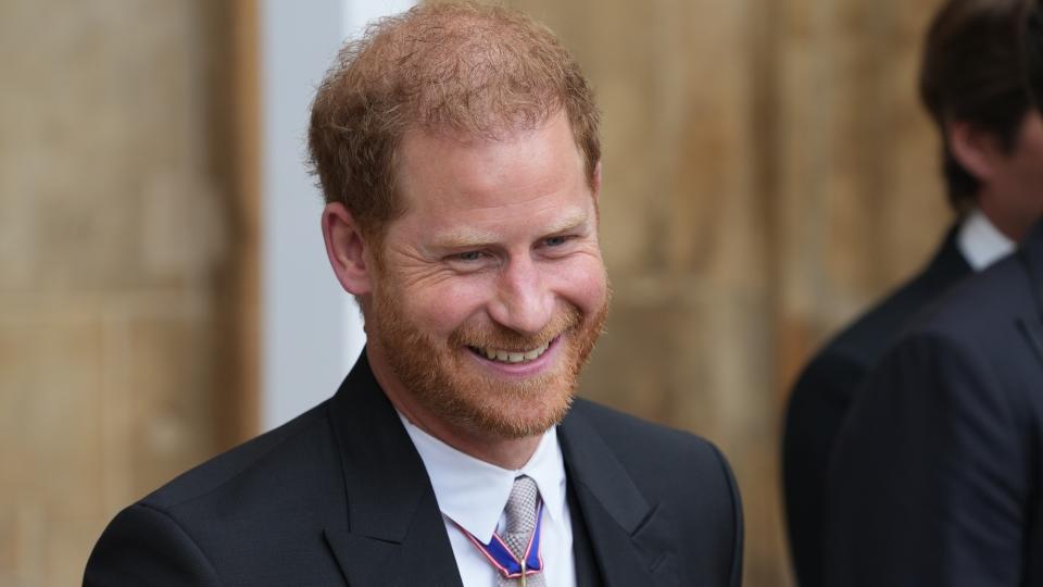 Prince Harry leaves after the Coronation of King Charles III and Queen Camilla on May 6, 2023 in London, England