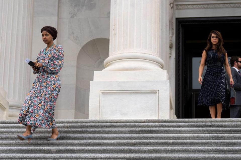 Ilhan Omar and Lauren Boebert walk down the Capitol steps