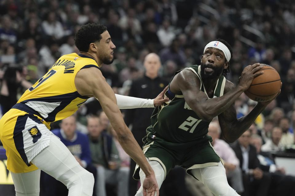 Milwaukee Bucks' Patrick Beverley tries to get past Indiana Pacers' Andrew Nembhard during the first half of Game 5 of the NBA playoff basketball series Tuesday, April 30, 2024, in Milwaukee. (AP Photo/Morry Gash)