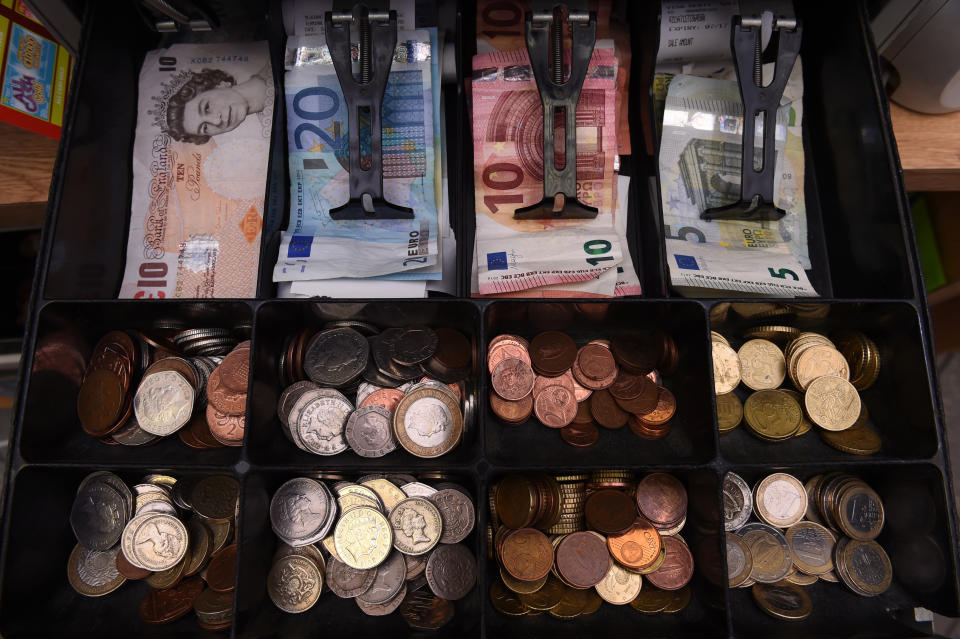 A shop cash register is seen with both Sterling and Euro currency in the till at the border town of Pettigo, Ireland October 14, 2016. REUTERS/Clodagh Kilcoyne