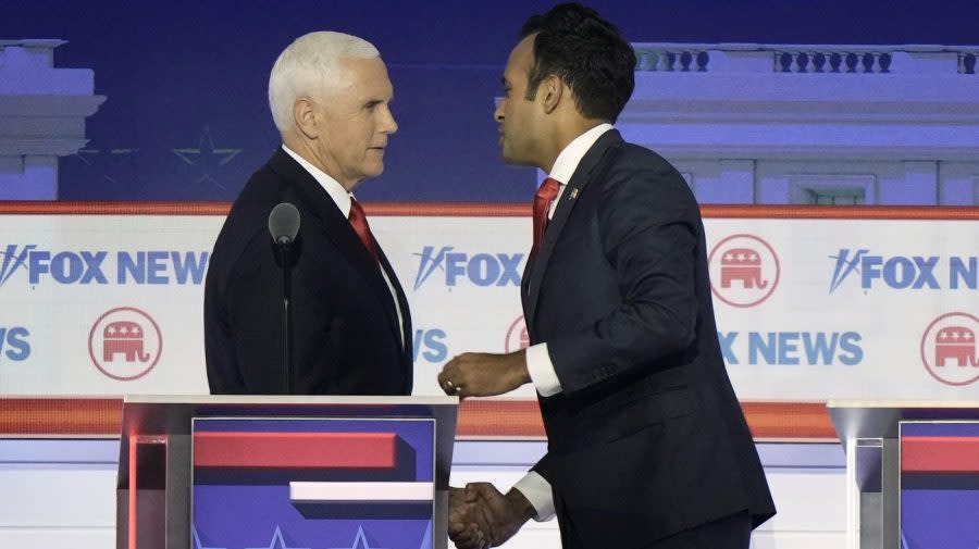 <em>Businessman Vivek Ramaswamy shakes hands with former Vice President Mike Pence after a Republican presidential primary debate hosted by FOX News Channel on Wednesday, Aug. 23, 2023, in Milwaukee.</em> (AP Photo/Morry Gash)
