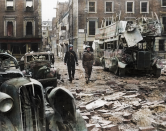 <p>A police officer and soldier inspect the aftermath of a devastating air raid on Portman Street in Marylebone, Central London. (MediaDrumWorld) </p>