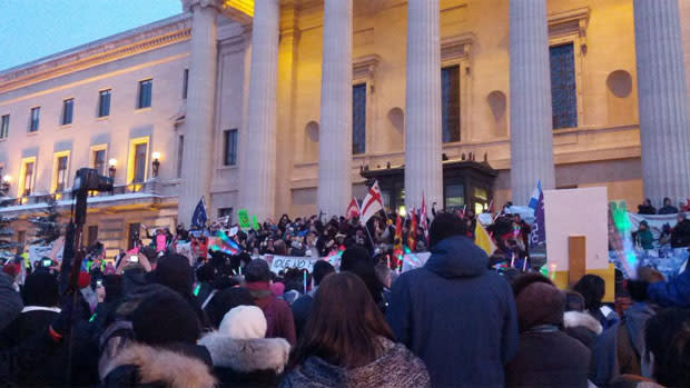 Hundreds of demonstrators gather in front of the Manitoba legislature for an Idle No More rally late Monday afternoon.