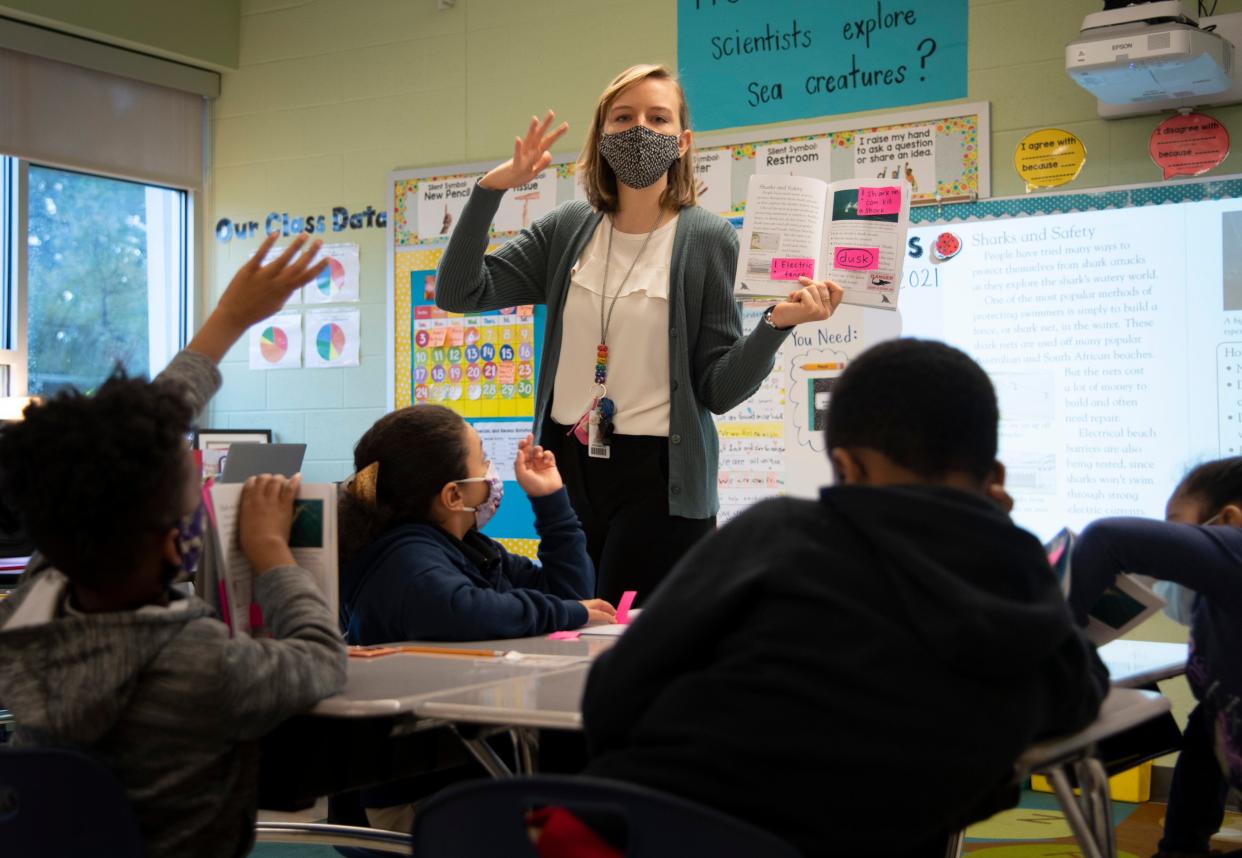 Third grade teacher Stephanie Fine leads a reading lesson for her students at Norman Binkley Elementary School Monday, Oct. 25, 2021 in Nashville, Tenn. 